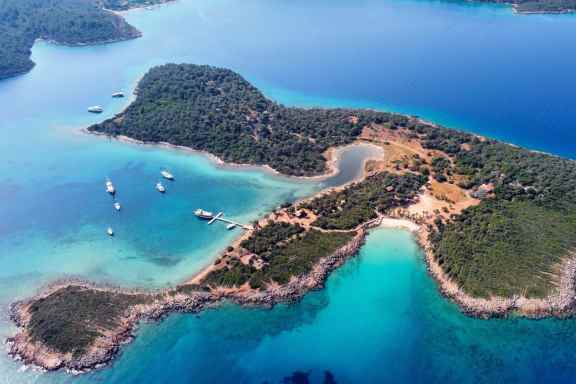 Yachts anchored off Sedir Island (Cleopatra Island), Turkey